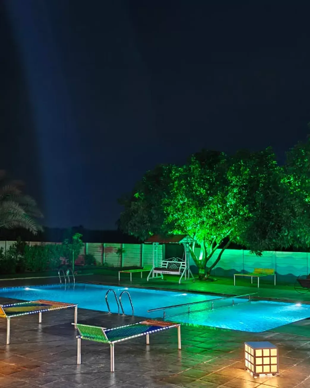 Poolside turf stretch beside the infinity pool